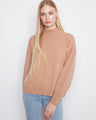 Sweater with a stylish mock neck, perfect for layering and adding warmth to your outfit. By Charlie B.