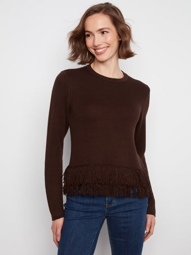 Elegant brown sweater featuring long sleeves and a unique fringed hem detail, adding texture and style. Ideal for cooler days. By Charlie B.