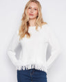 White sweater with a classic crew neck design, featuring elegant long sleeves. Finished by Charlie B.