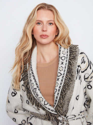 Close-up showcasing the luxurious texture and exquisite fringe detailing on this elegant piece by Charlie B.