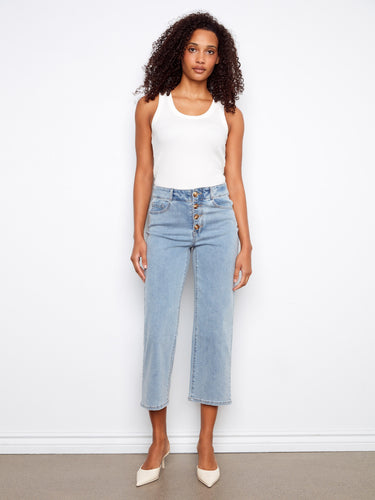 Stretch denim cropped jeans in light blue with front buttons, ideal for everyday wear by Charlie B.