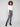 Grey jeans with a bootcut fit and stylish design, featuring a frayed hem for added flair by Charlie B.