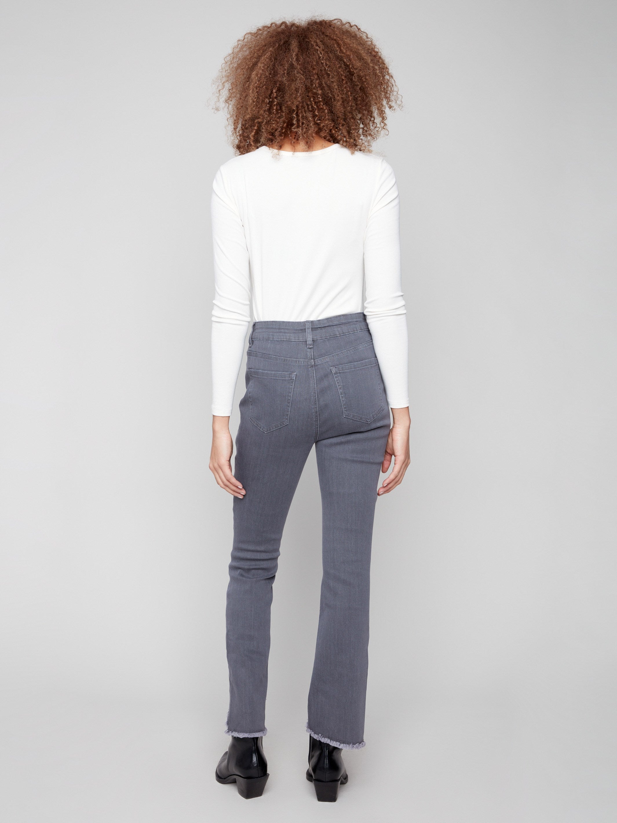 The five-pocket design of these grey jeans enhances functionality while maintaining chic aesthetics by Charlie B.