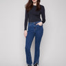 Indigo jeans featuring a stylish bootcut fit and chic frayed hem detail, perfect for any casual outing by Charlie B.