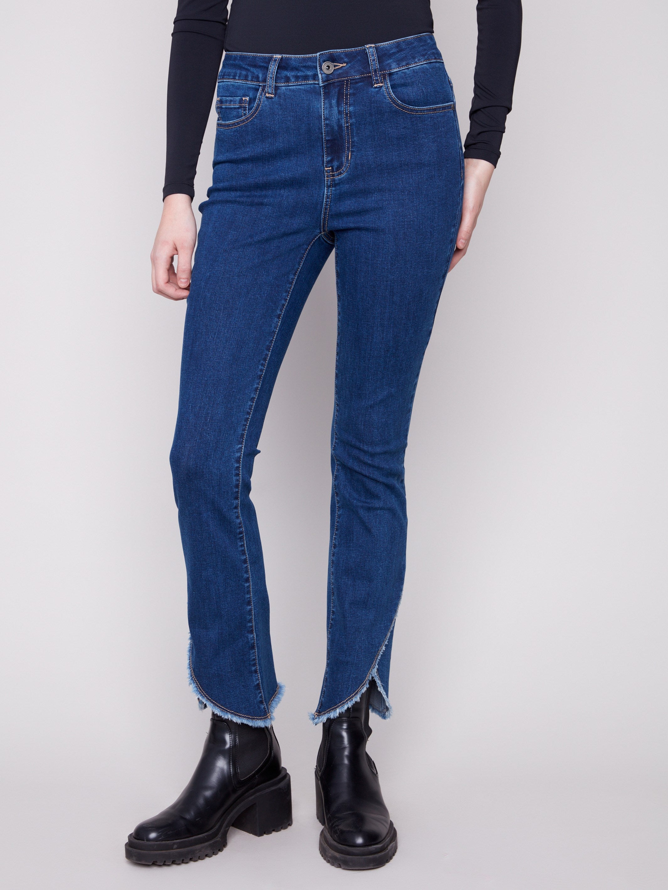 These jeans showcase a modern five-pocket design with a comfortable stretch denim fabric, ideal for all-day wear by Charlie B.