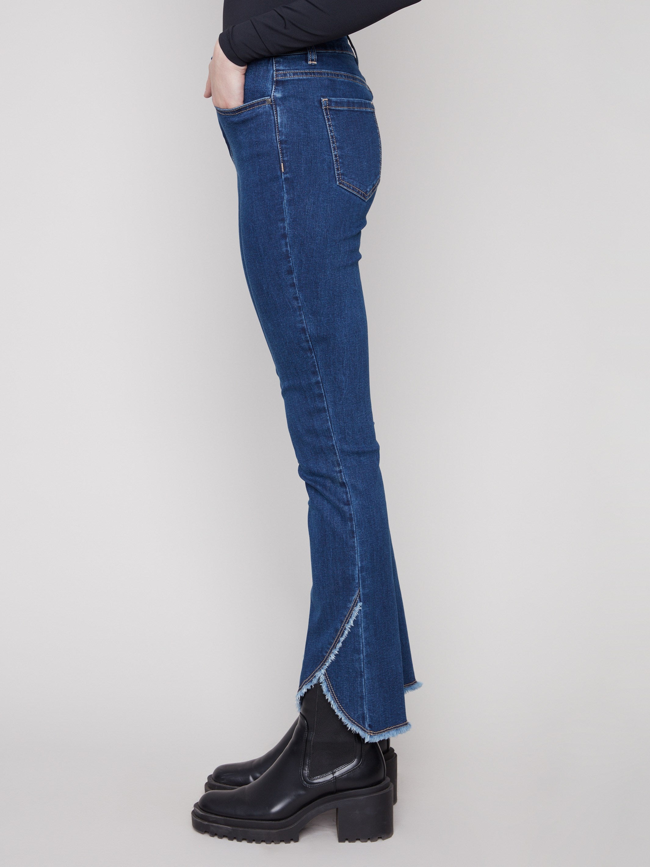 Crafted with regular rise and front tulip hem, these indigo jeans offer both comfort and style by Charlie B.