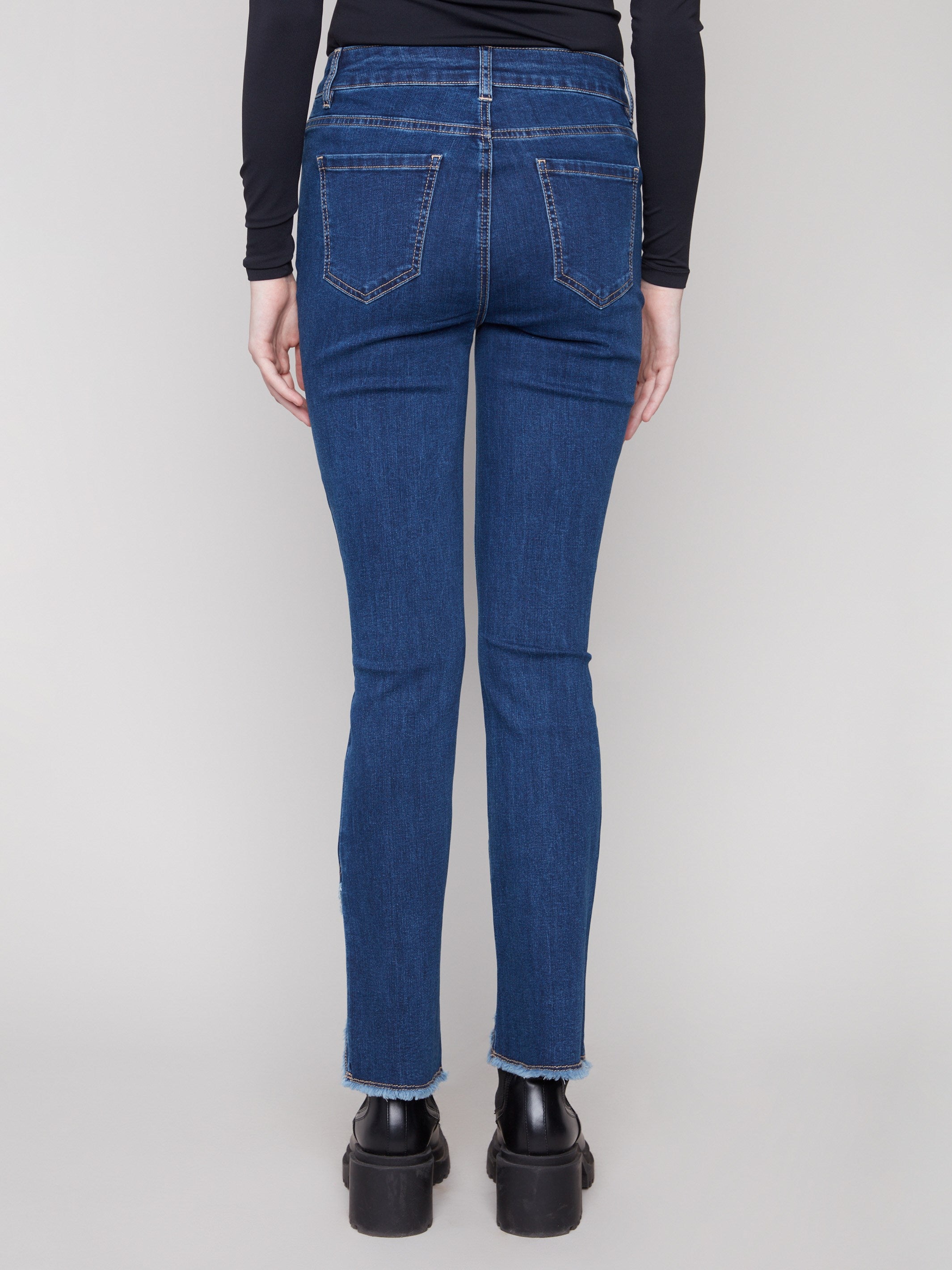 Experience the perfect blend of fashion and function with these indigo bootcut jeans in premium stretch denim by Charlie B.
