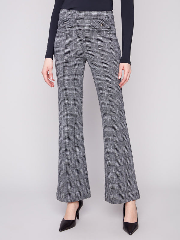 These pants feature a long length design, perfect for both formal and casual settings by Charlie B.