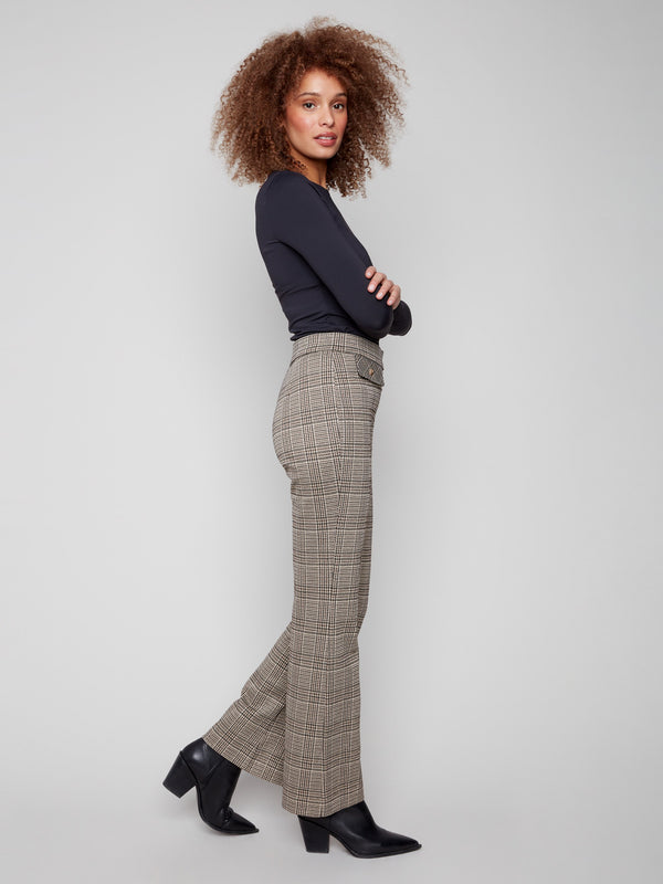 Plaid flare pants crafted with stretch fabric for ease and elegance in every step by Charlie B.