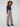 Experience the luxurious feel of Lurex thread in these classic plaid flare pants by Charlie B.