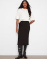 This stylish skirt features a straight fit, offering a sleek silhouette for any occasion. By Charlie B.