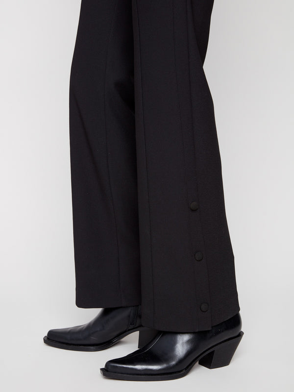 Stretch crepe fabric enhances the comfort of these black pants and white top outfit by Charlie B.