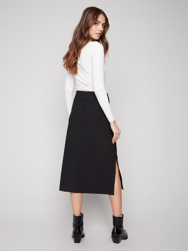 Sophisticated midi-length skirt in black crepe with sleek stretch fabric by Charlie B, ideal for versatile styling.