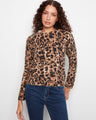 Leopard print sweater with a classic crew neck design, perfect for casual outings. The soft fabric adds a touch of luxury. By Charlie B.