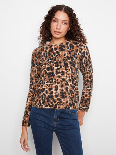 Leopard print sweater with a classic crew neck design, perfect for casual outings. The soft fabric adds a touch of luxury. By Charlie B.