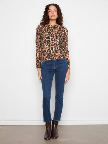 Long-sleeved leopard print top offering both style and comfort, ideal for any season's fashion-forward looks. By Charlie B.