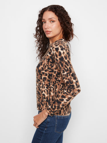 Exquisite leopard pattern enhances this crew neck sweater's appeal, perfect for elevating your everyday ensemble. By Charlie B.