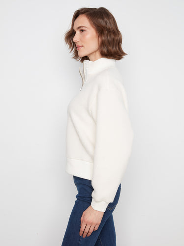 Ribbed cuffs and hem provide a snug fit on this comfortable fleece top by Charlie B.