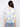 This garment's crew neckline complements the artistic crochet pattern, creating a harmonious and stylish look by Charlie B.