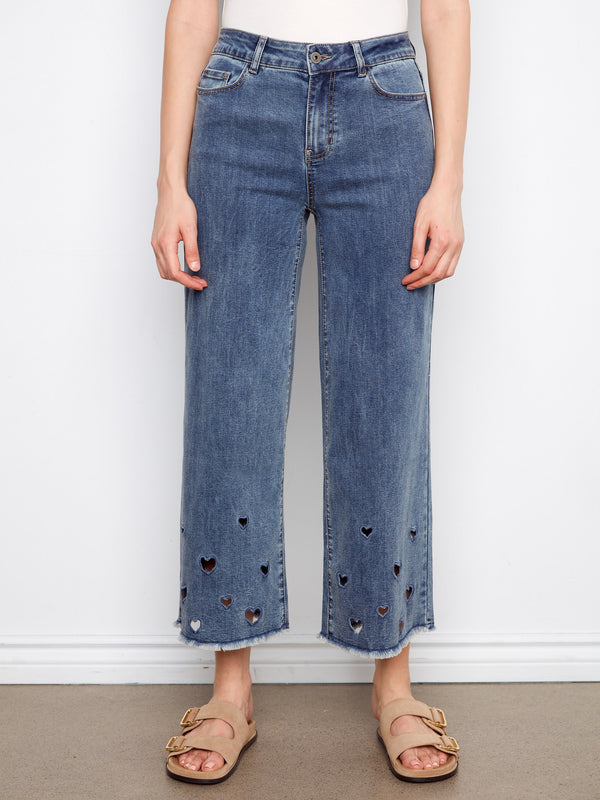 Stylish cropped length jeans in medium blue with charming heart cutouts at the hem by Charlie B.