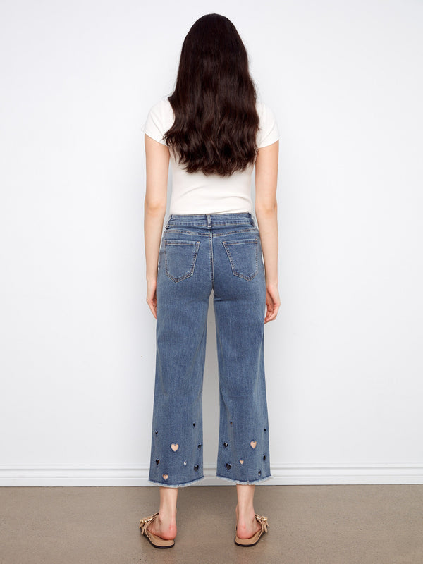 Crafted from stretch denim, these medium blue wide-leg jeans ensure all-day comfort and style by Charlie B.
