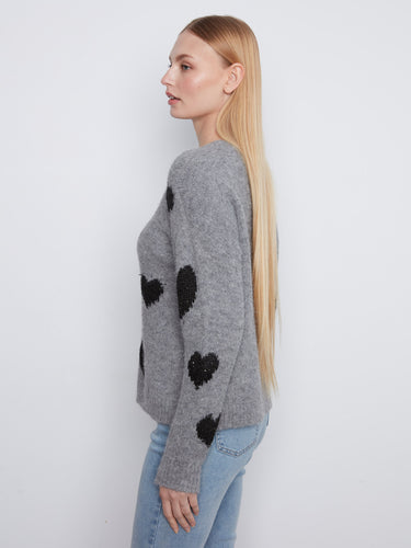 Embrace comfort with this grey sweater's drop shoulders, adorned with delicate heart designs. Created by Charlie B.