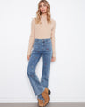 Denim jeans with a stylish flare leg, featuring a heart embroidery design for a playful touch. Crafted for comfort by Charlie B.