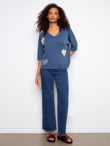 Stylish relaxed fit sweater with playful heart details, ideal for a cozy yet chic look by Charlie B.