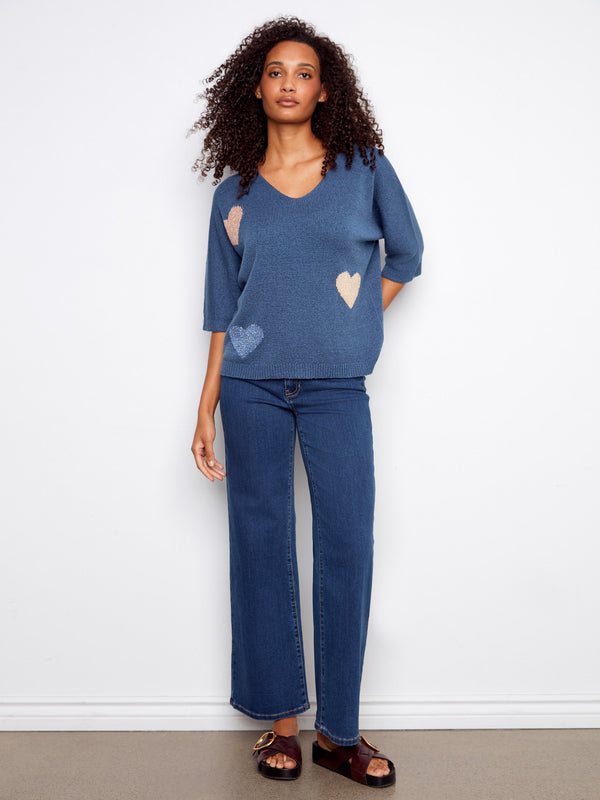 Stylish relaxed fit sweater with playful heart details, ideal for a cozy yet chic look by Charlie B.