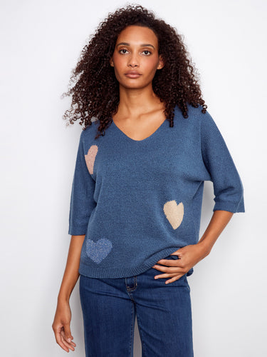 Elegant elbow sleeve sweater adorned with cute heart motifs for a touch of fun by Charlie B.