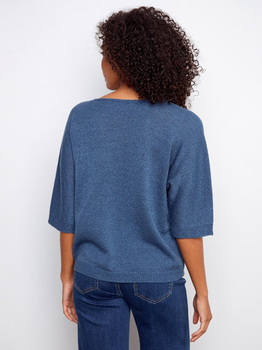 Soft knit sweater with shimmering lurex thread accents, adding sparkle to your wardrobe by Charlie B.