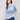 Blue and white sweater featuring a heart pattern with a drawstring hood for added style by Charlie B.
