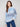 Blue and white sweater featuring a heart pattern with a drawstring hood for added style by Charlie B.