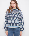 Navy sweater featuring a drop shoulder design with heart jacquard pattern by Charlie B.