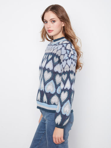 Chic navy pullover adorned with hearts, offering a unique drop shoulder style by Charlie B.