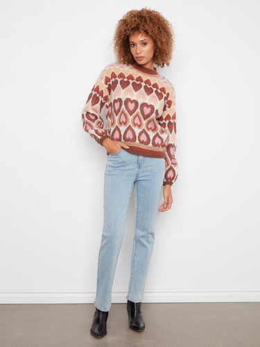 Featuring a mock neck, this sweater offers both style and warmth for cooler days. Crafted by Charlie B.