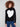 Black sweater adorned with a bold intarsia heart, complemented by ribbed shoulders for added texture by Charlie B.
