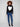 Elegant black sweater showcasing a white heart and featuring a stylish ribbed mock neck design by Charlie B.