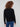Sophisticated black sweater with drop shoulder design and an eye-catching white heart motif by Charlie B.