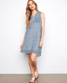 Dress featuring a half-button design with geometric pattern, perfect for casual outings by Charlie B.