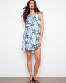 Embrace elegance with a Henley neckline dress featuring a charming floral pattern, perfect for any occasion by Charlie B.