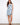 Embrace elegance with a Henley neckline dress featuring a charming floral pattern, perfect for any occasion by Charlie B.