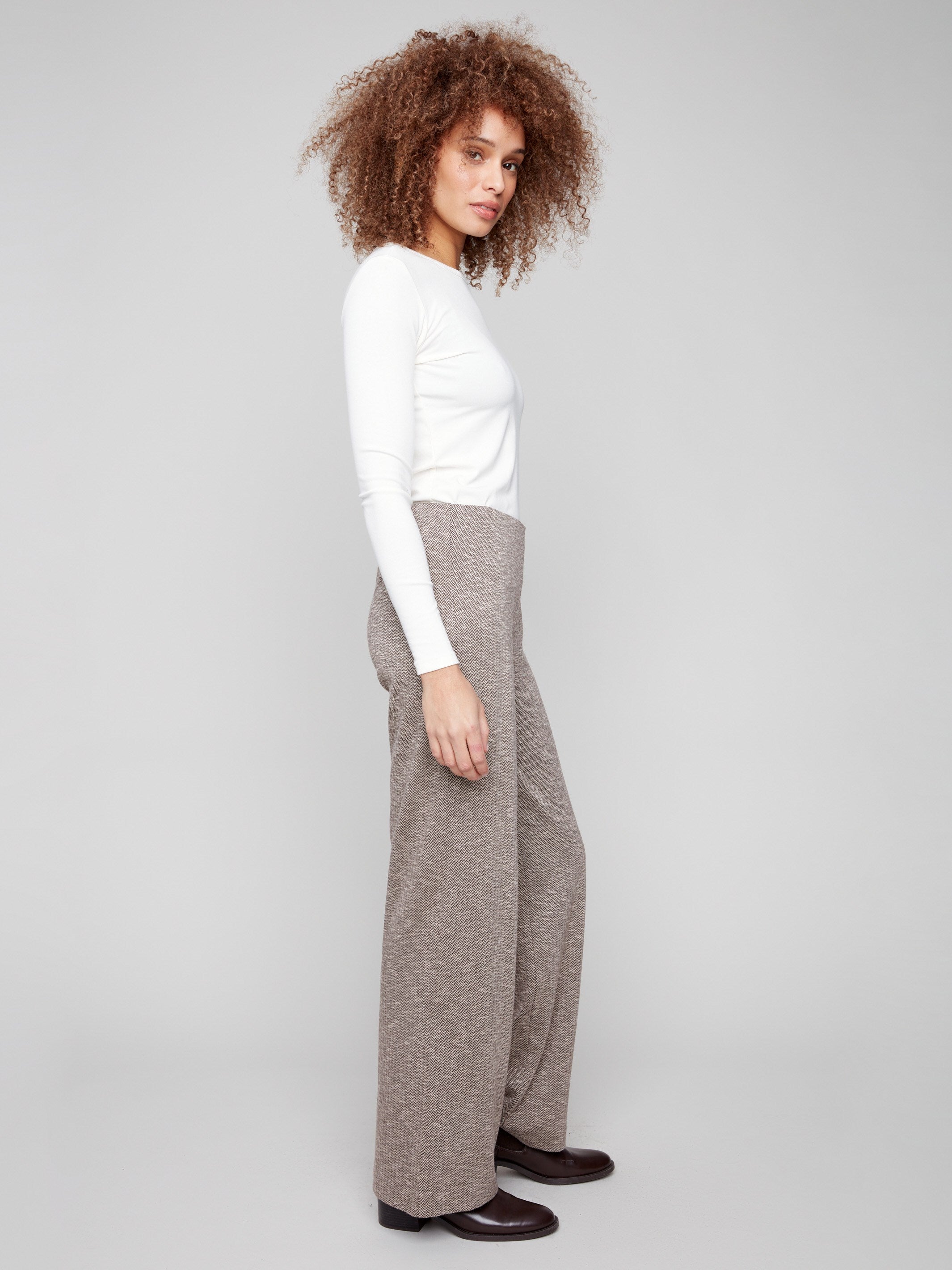 Mocha herringbone pants featuring stretch fabric, ensuring a perfect fit and chic look by Charlie B.