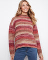 A cozy sweater featuring a mock neckline in warm hues of red and brown with a textured knit, perfect for chilly days. By Charlie B.