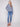 Elegant heather denim sweater showcasing a unique hem slit detail, ideal for layering by Charlie B.
