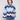 Blue sweater featuring a chevron pattern, paired with casual jeans for a stylish look by Charlie B.