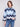Blue sweater featuring a chevron pattern, paired with casual jeans for a stylish look by Charlie B.