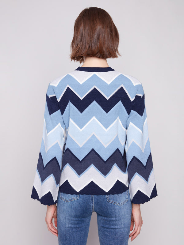 Chevron patterned sweater in shades of blue with a comfortable crew neckline design by Charlie B.