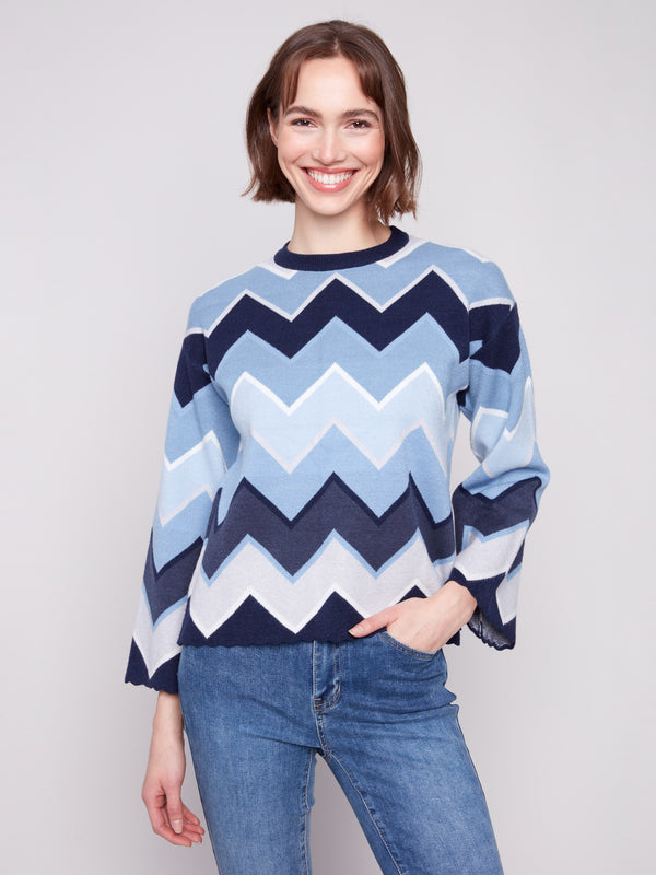 Elegant blue chevron sweater with unique bell sleeves adds flair to your wardrobe by Charlie B.
