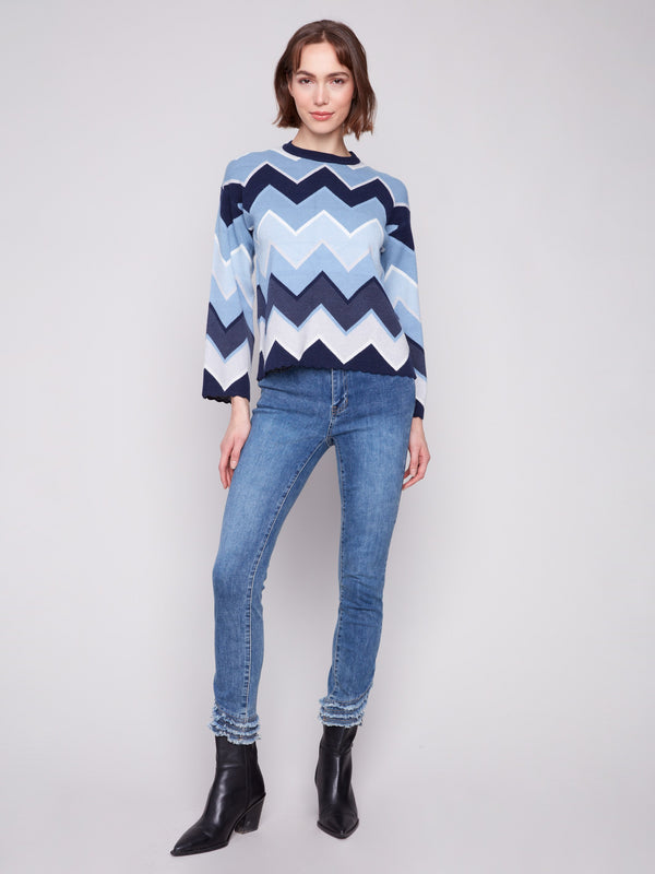 Versatile crew neckline complements the bold chevron pattern on this stylish blue sweater by Charlie B.